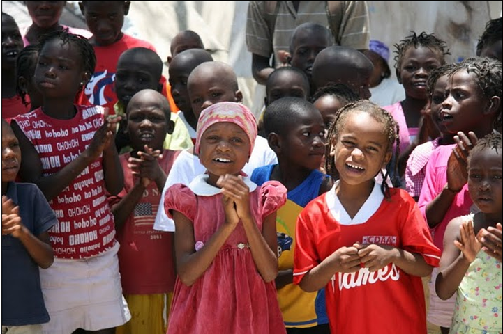 Image of children singing at the Foyer des Enfants in Haiti, June 29, 2011.